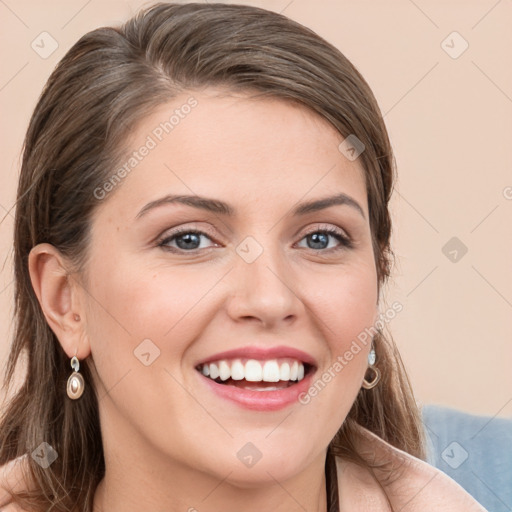 Joyful white young-adult female with medium  brown hair and blue eyes