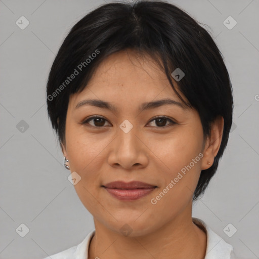 Joyful asian young-adult female with medium  black hair and brown eyes