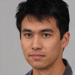 Neutral asian young-adult male with short  brown hair and brown eyes