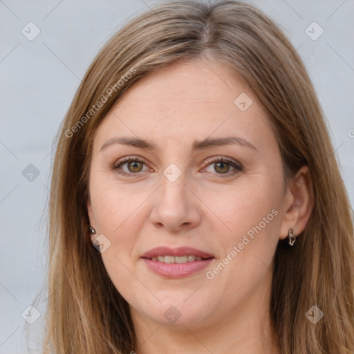 Joyful white young-adult female with long  brown hair and brown eyes