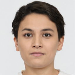 Neutral white young-adult female with short  brown hair and brown eyes