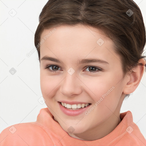 Joyful white child female with short  brown hair and brown eyes