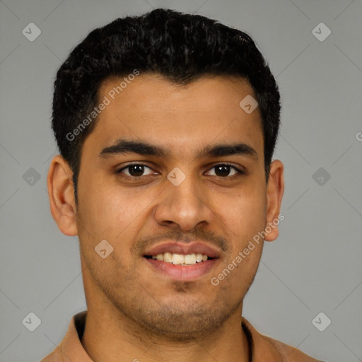 Joyful latino young-adult male with short  brown hair and brown eyes