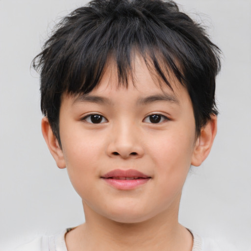 Joyful asian child female with short  brown hair and brown eyes