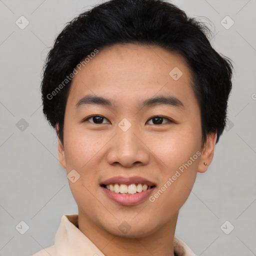 Joyful asian young-adult male with short  black hair and brown eyes