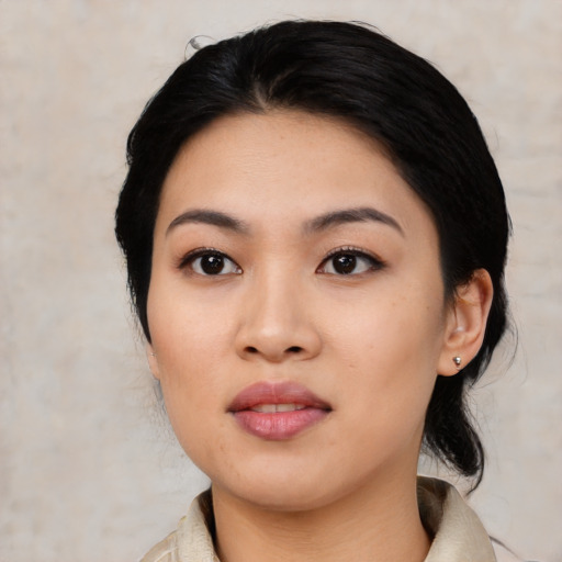 Neutral asian young-adult female with medium  black hair and brown eyes