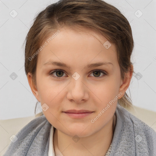 Joyful white child female with short  brown hair and brown eyes