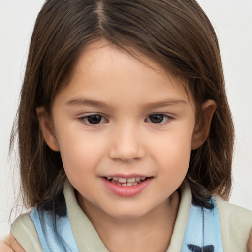 Joyful white child female with medium  brown hair and brown eyes