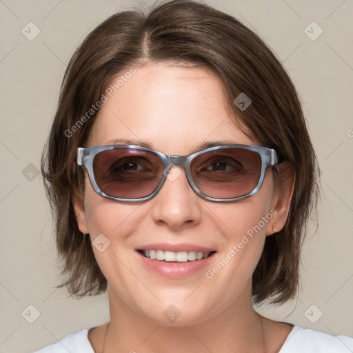 Joyful white young-adult female with medium  brown hair and blue eyes