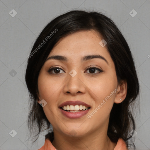 Joyful asian young-adult female with medium  black hair and brown eyes