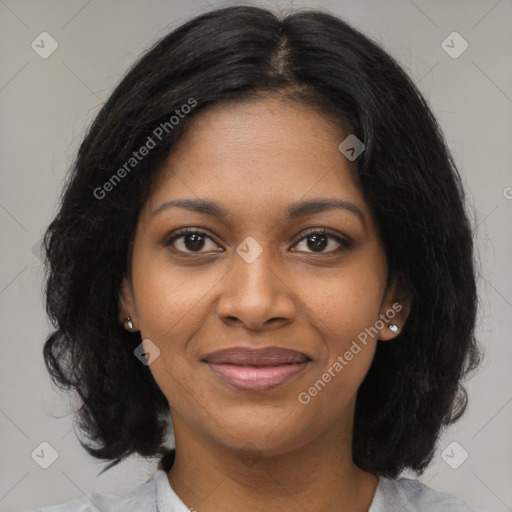 Joyful black young-adult female with medium  brown hair and brown eyes