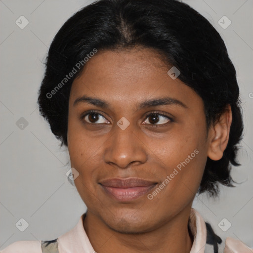 Joyful black young-adult female with medium  brown hair and brown eyes