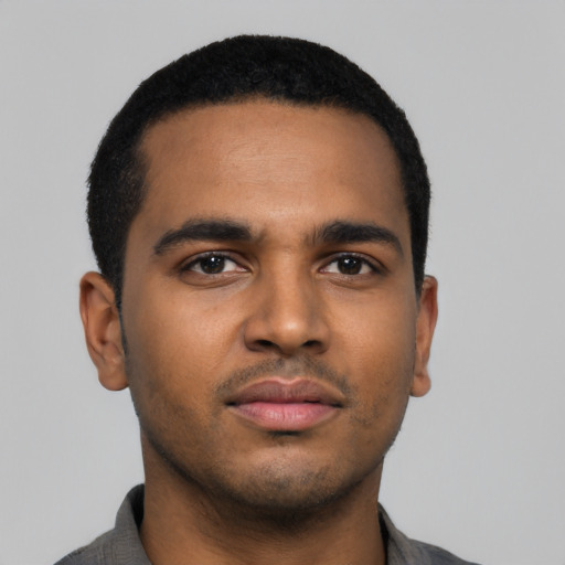 Neutral black young-adult male with short  black hair and brown eyes