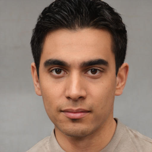 Neutral white young-adult male with short  black hair and brown eyes
