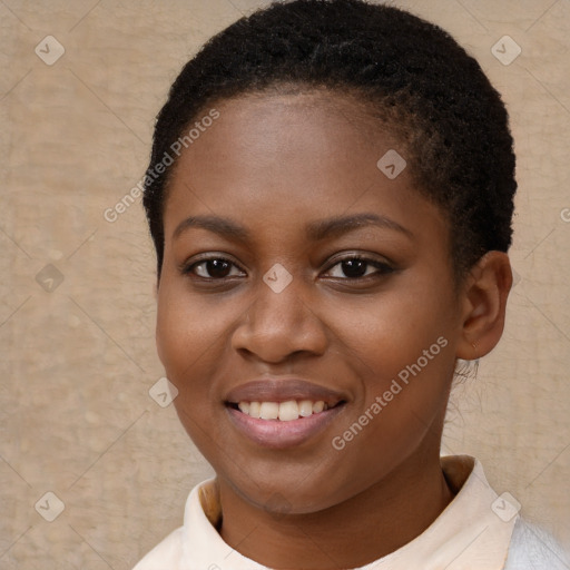 Joyful black young-adult female with short  brown hair and brown eyes