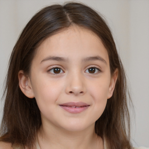 Joyful white child female with medium  brown hair and brown eyes