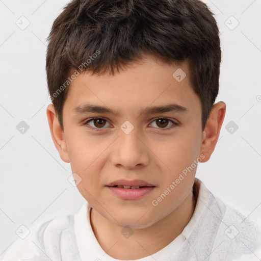 Joyful white child male with short  brown hair and brown eyes