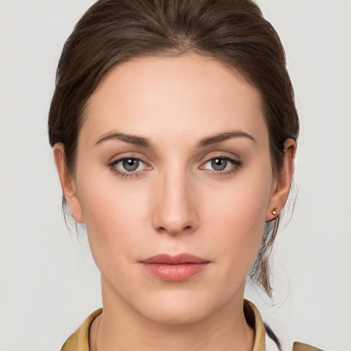 Neutral white young-adult female with medium  brown hair and brown eyes