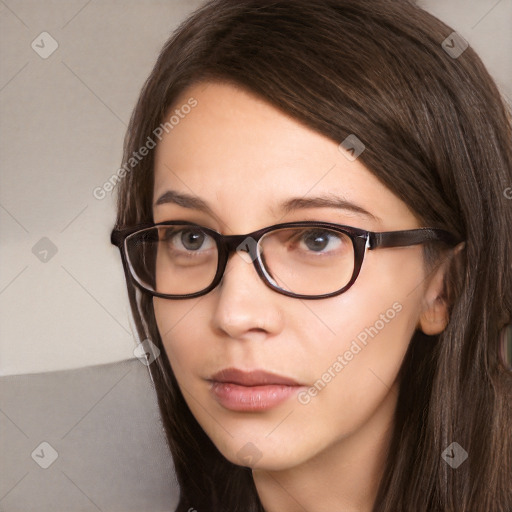 Neutral white young-adult female with long  brown hair and brown eyes