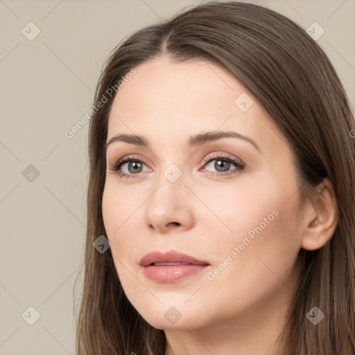 Neutral white young-adult female with long  brown hair and brown eyes