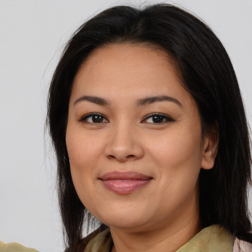 Joyful asian young-adult female with medium  brown hair and brown eyes