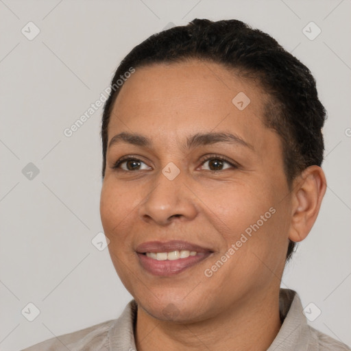 Joyful white adult female with short  brown hair and brown eyes