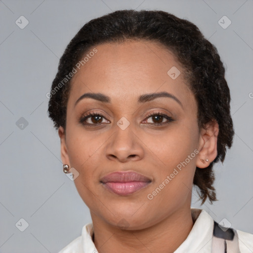 Joyful latino adult female with medium  brown hair and brown eyes