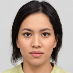 Neutral asian young-adult female with medium  brown hair and brown eyes