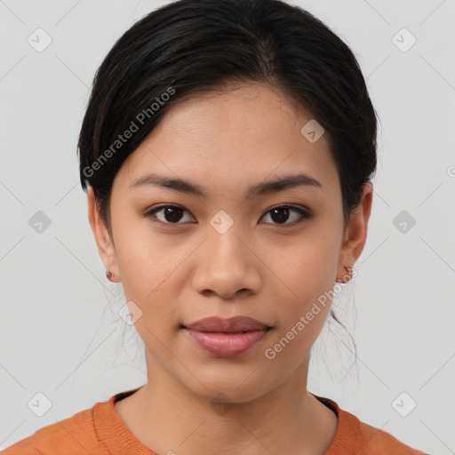 Joyful asian young-adult female with medium  brown hair and brown eyes