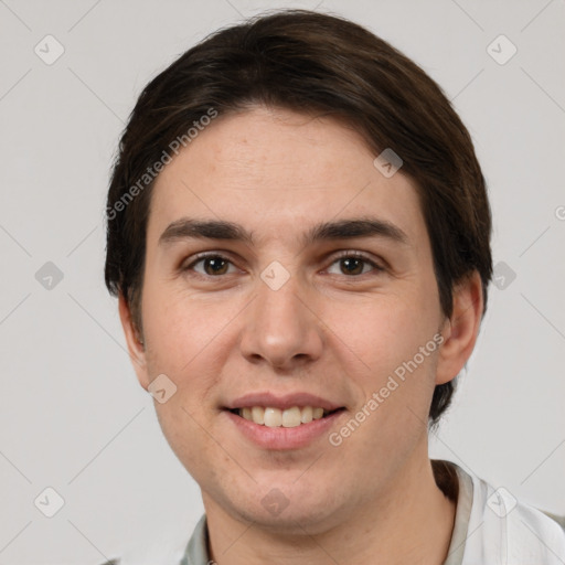 Joyful white young-adult male with short  brown hair and brown eyes