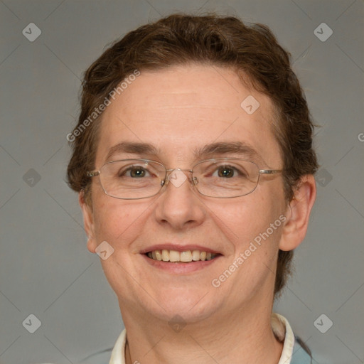 Joyful white adult female with short  brown hair and grey eyes