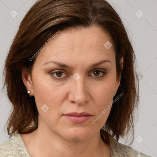 Joyful white young-adult female with medium  brown hair and green eyes