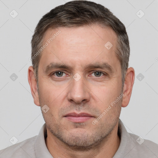 Neutral white adult male with short  brown hair and brown eyes