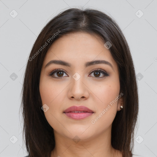 Joyful latino young-adult female with long  brown hair and brown eyes