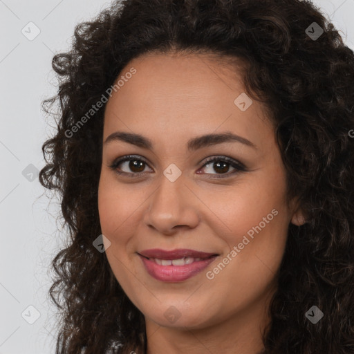 Joyful latino young-adult female with long  brown hair and brown eyes