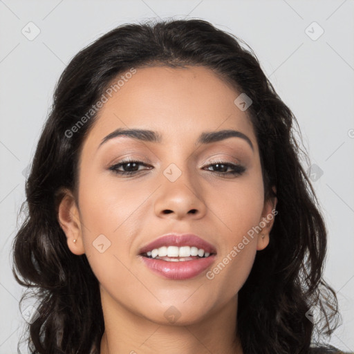 Joyful latino young-adult female with long  brown hair and brown eyes