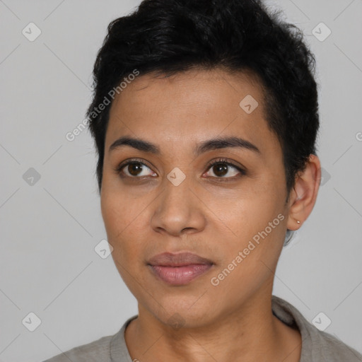 Joyful latino young-adult female with short  black hair and brown eyes