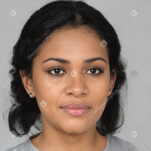 Joyful black young-adult female with medium  black hair and brown eyes