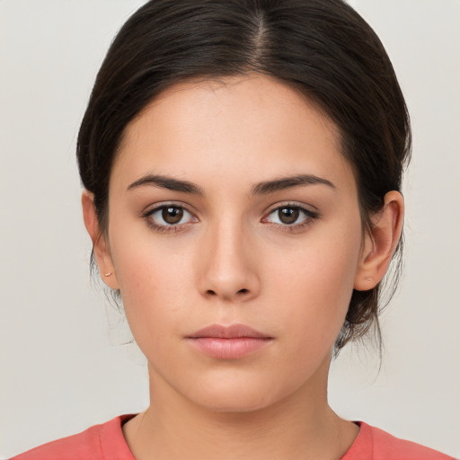 Neutral white young-adult female with medium  brown hair and brown eyes