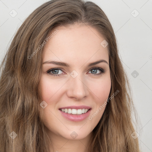 Joyful white young-adult female with long  brown hair and green eyes