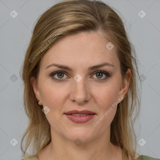 Joyful white young-adult female with medium  brown hair and green eyes