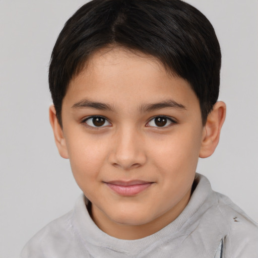 Joyful white child female with short  brown hair and brown eyes
