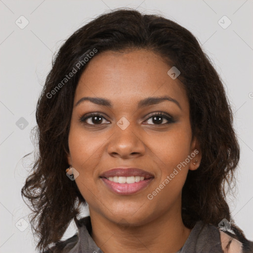 Joyful black young-adult female with medium  brown hair and brown eyes