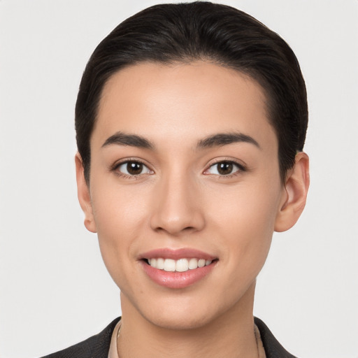 Joyful white young-adult female with short  brown hair and brown eyes