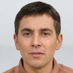 Neutral white adult male with short  brown hair and brown eyes