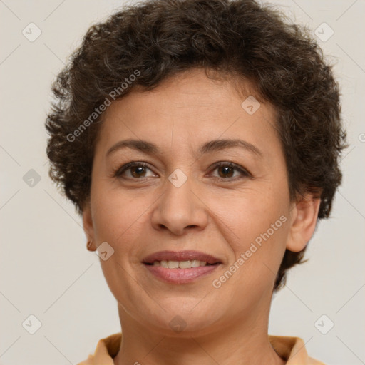 Joyful white adult female with short  brown hair and brown eyes