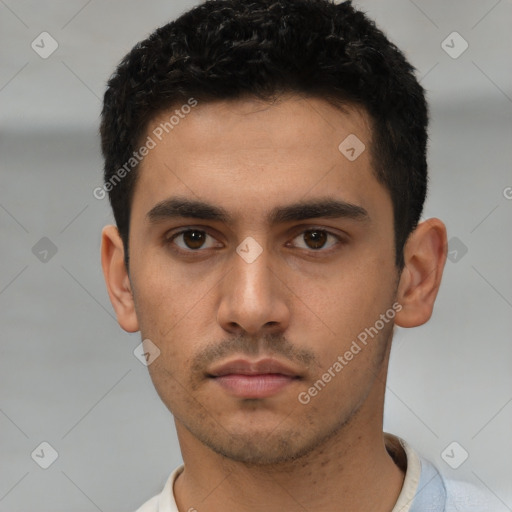 Neutral latino young-adult male with short  black hair and brown eyes