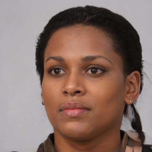 Neutral black young-adult female with short  black hair and brown eyes