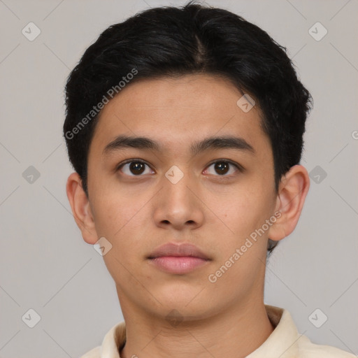 Neutral latino young-adult male with short  black hair and brown eyes