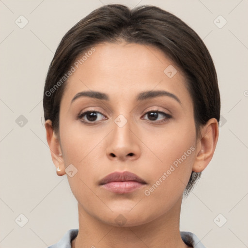 Neutral white young-adult female with short  brown hair and brown eyes